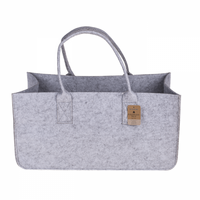 Grijze vilten opbergzak voor brandhout en plaids