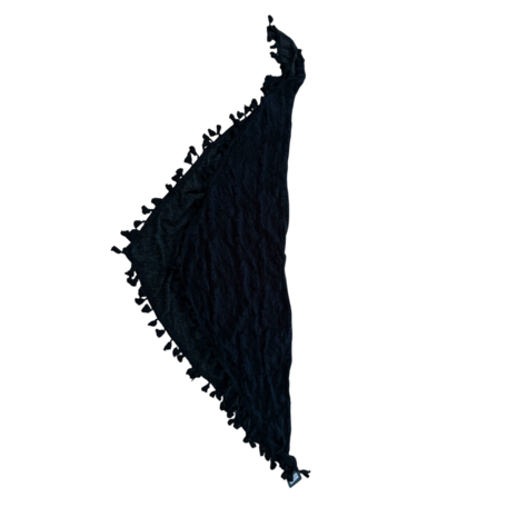 Detail van bewerkte zwarte laag en effen antraciet laag – textuur close-up